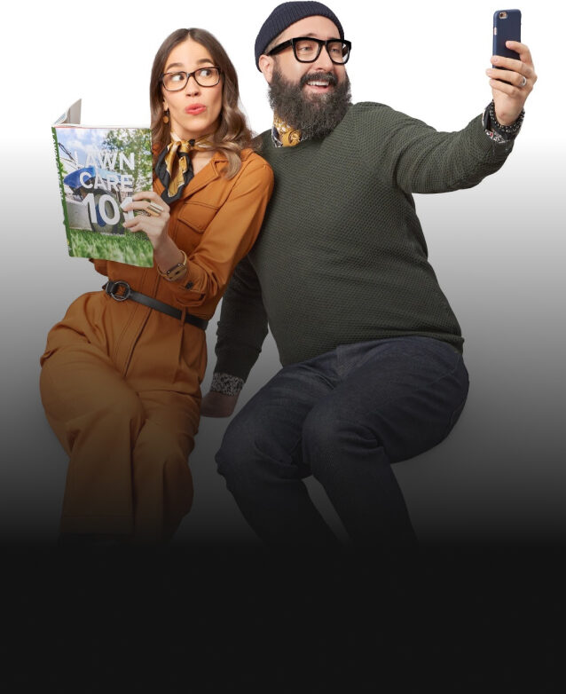 The characters from the BIMM-created Leon's ad, posing for a selfie with a lawn care book.